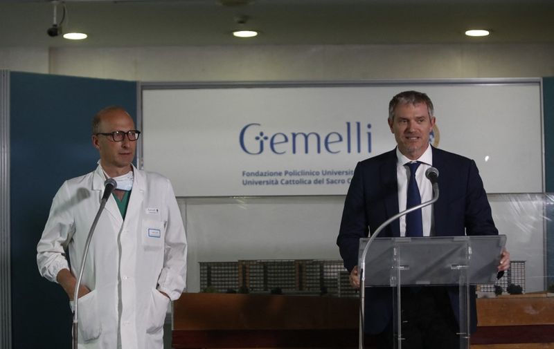 ROME, ITALY - JUNE 08: Italian surgeon Sergio Alfieri (L) flanked by Director of the Holy See Press Office Matteo Bruni (R) attends a press conference at the Policlinico Gemelli hospital, where in the afternoon he performed abdominal surgery on Pope Francis, in Rome, Italy, on June 07, 2023. Riccardo De Luca / Anadolu Agency (Photo by RICCARDO DE LUCA / ANADOLU AGENCY / Anadolu Agency via AFP)