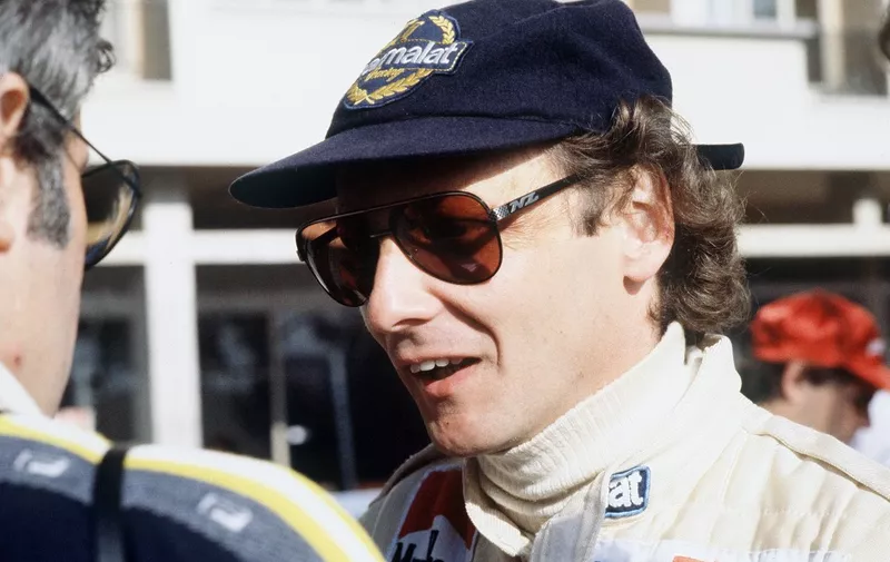 (FILES) In this file photo taken on May 1, 1979, Austrian Formula One driver Niki Lauda talks to a mechanic during the Monaco Grand Prix. - Legendary Formula One driver Niki Lauda has died at the age of 70, his family said in a statement released to Austrian media early Tuesday, May 21, 2019. (Photo by GERARD FOUET / AFP)