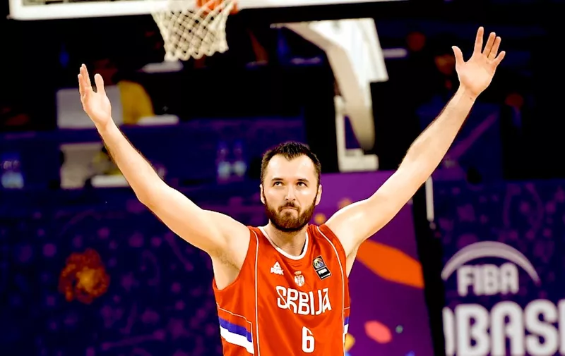 Serbia`s Milan Macvan celebrates after scoring a basket during the FIBA Eurobasket 2017 men`s Semi Final basketball match between Russia and Serbia at Sinan Erdem Sport Arena in Istanbul on September 15, 2017. (Photo by OZAN KOSE / AFP)