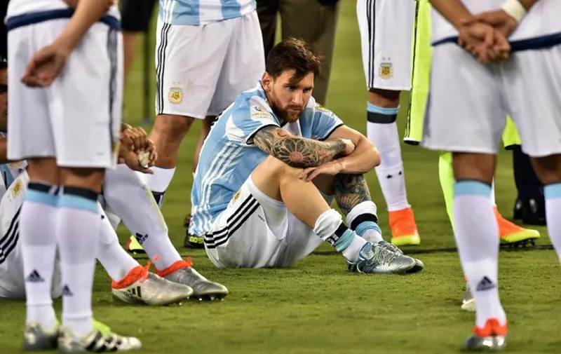 Argentina's Lionel Messi waits to receive the second place medal during the Copa America Centenario awards ceremony in East Rutherford, New Jersey, United States, on June 26, 2016.  / AFP PHOTO / Nicholas Kamm