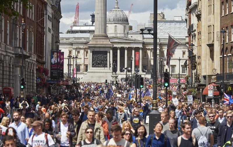 Thousands of protesters file down Whitehall as they take part in a March for Europe, through the centre of London on July 2, 2016, to protest against Britain's vote to leave the EU, which has plunged the government into political turmoil and left the country deeply polarised.
Protesters from a variety of movements march from Park Lane to Parliament Square to show solidarity with those looking to create a more positive, inclusive kinder Britain in Europe. / AFP PHOTO / Niklas HALLE'N