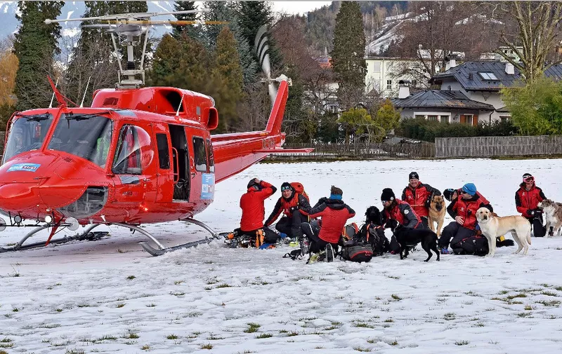 Rescue teams prepare to search for a group of people buried by an avalanche at the Wattener Lizum, Austria, on February 6, 2016. - Five skiers from the Czech Republic were killed in an avalanche in the Austrian alps that also engulfed 12 other people, police said. Police gave no immediate details on the condition of the other casualties in the incident, which occurred around midday in a valley south of Innsbruck in western Austria. (Photo by ZOOM.TIROL / APA / AFP) / Austria OUT