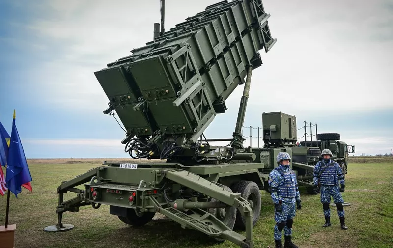 A Patriot rocket launcher system of the Romanian army is on the static display during an army drill at the Capu Midia military shooting range next to the Black Sea November 15, 2023. Romanian army drill took place aiming to identify, trace and destroy aerial drones targets. (Photo by Daniel MIHAILESCU / AFP)