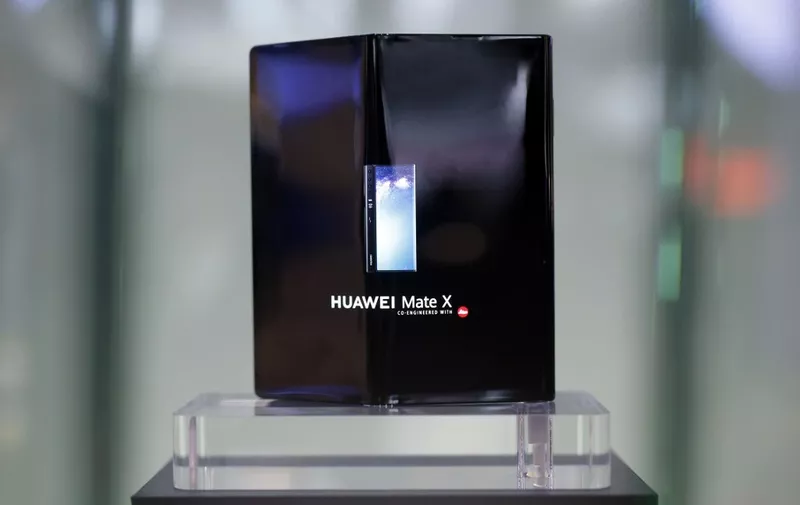 Huawei Mate X foldable smartphone is displayed at the Mobile World Congress (MWC) in Barcelona on February 28, 2019. - Phone makers will focus on foldable screens and the introduction of blazing fast 5G wireless networks at the world's biggest mobile fair as they try to reverse a decline in sales of smartphones. (Photo by Pau Barrena / AFP)