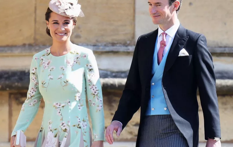 Pippa Middleton and James Matthews arrive for the wedding ceremony of Britain's Prince Harry, Duke of Sussex and US actress Meghan Markle at St George's Chapel, Windsor Castle, in Windsor, on May 19, 2018. (Photo by Chris Jackson / POOL / AFP)