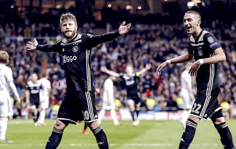 MADRID, 05-03-2019, Stadium Bernabeu, season 2018 / 2019 , Champions League 1/8th round second leg.  Ajax player Lasse Schone (L) and Ajax player Hakim Ziyech (R) celebrating 1-4 during the game Real Madrid - Ajax ., Image: 417482657, License: Rights-managed, Restrictions: *** World Rights Except Austria and The Netherlands ***, Model Release: no, Credit line: Profimedia, SIPA USA