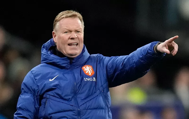 Netherlands' head coach Ronald Koeman gives instructions from the side line during the Euro 2024 group B qualifying soccer match between France and the Netherlands at the Stade de France in Saint Denis, outside Paris, France, Friday, March 24, 2023. (AP Photo/Christophe Ena)
