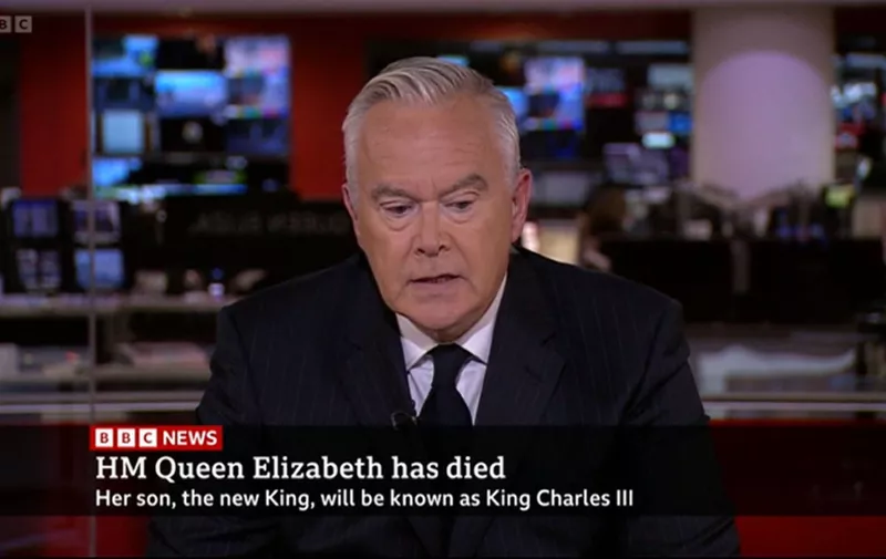 TV OUT. ALL BROADCAST WEBSITES OUT. No cropping permitted. Picture must be credited to BBC News. We are advised that videograbs should not be used more than 48 hours after the time of original transmission, without the consent of the copyright holder. Screengrab from BBC News of Huw Edwards reporting on the death of Queen Elizabeth II. Issue date: Thursday September 8, 2022.,Image: 720723217, License: Rights-managed, Restrictions: , Model Release: no