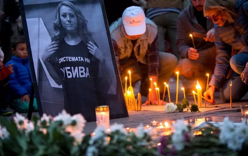People take part in a vigil in memory of murdered Bulgarian TV journalist Viktoria Marinova in Sofia on October 8, 2018. - Corruption-plagued EU member Bulgaria found itself under pressure to find the killer of a television journalist whose brutal murder at the weekend has shocked the country and sparked international condemnation. (Photo by Nikolay DOYCHINOV / AFP)