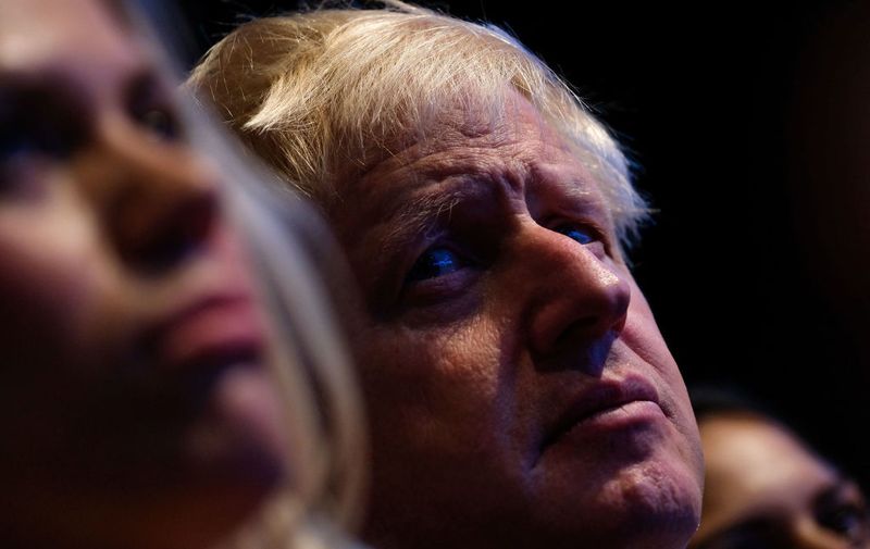 MANCHESTER, ENGLAND - SEPTEMBER 30: Prime Minister Boris Johnson listens to Sajid Javid, Chancellor of the Exchequer as he delivers his speech on the second day of the Conservative Party Conference at Manchester Central on September 30, 2019 in Manchester, England. Despite Parliament voting against a government motion to award a recess, Conservative Party Conference still goes ahead. Parliament will continue with its business for the duration. (Photo by Ian Forsyth/Getty Images)