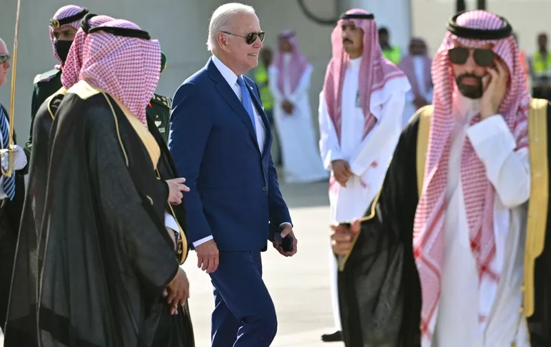 US President Joe Biden boards Air Force One before departing from King Abdulaziz International Airport in the Saudi city of Jeddah on July 16, 2022, at the end of his first tour in the Middle East as president. (Photo by MANDEL NGAN / AFP)