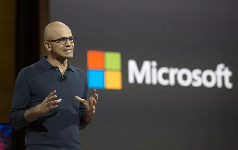 Microsoft chief executive officer Satya Nadella talks at a Microsoft news conference October 26, 2016 in New York. / AFP PHOTO / DON EMMERT