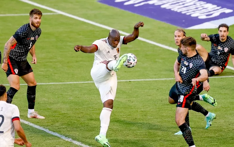 Belgium's captain Romelu Lukaku scores the 1-0 goal during a friendly football match during the Belgian national soccer team Red Devils and Croatia national team, in Brussels, on June 6, 2021, as part of the preparation for the Euro2020 tournament. (Photo by BRUNO FAHY / various sources / AFP) / Belgium OUT