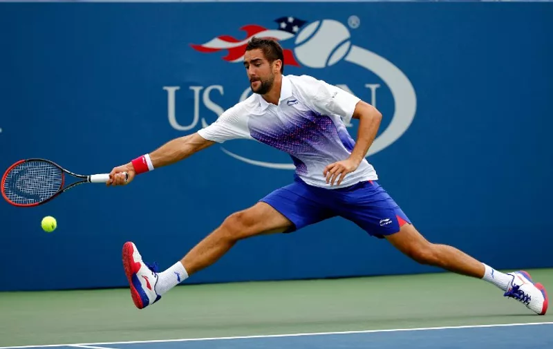 NEW YORK, NY - SEPTEMBER 04: Marin Cilic of Croatia returns a shot against Mikhail Kukushkin of Kazakhstan during their Men's Singles Third Round match on Day Five of the 2015 US Open at the USTA Billie Jean King National Tennis Center on September 4, 2015 in the Flushing neighborhood of the Queens borough of New York City.   Al Bello/Getty Images/AFP