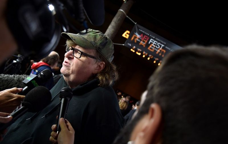 HOLLYWOOD, CA - NOVEMBER 07: Filmmaker Michael Moore attends the Centerpiece Gala Premiere of Dog Eat Dog Films' "Where to Invade Next" during AFI FEST 2015 presented by Audi at the Egyptian Theatre on November 7, 2015 in Hollywood, California.   Kevin Winter/Getty Images For FYI/AFP