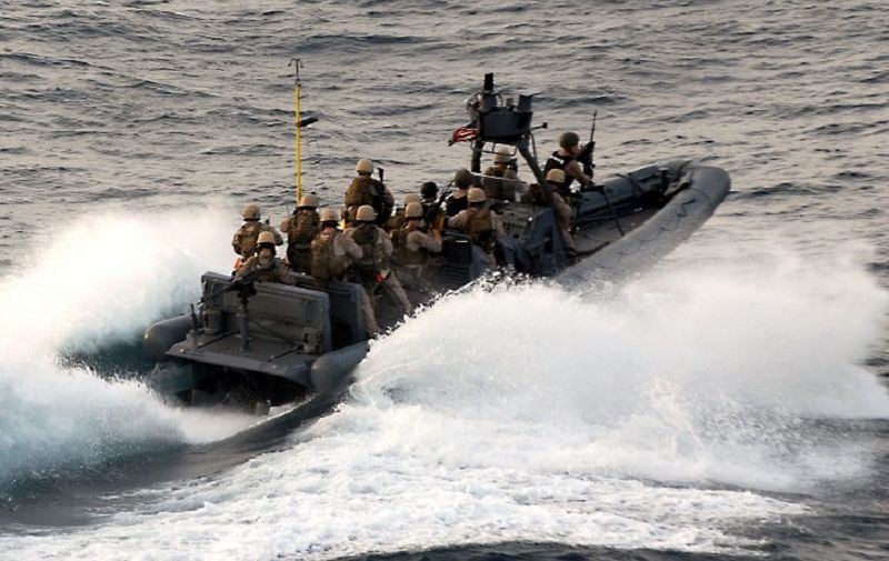 An image made available by the US Navy shows the first wave of assault force approaching the German-owned Magellan Star ship on September 9, 2010 to recover it from suspected pirates who attempted to highjack the vessel. Nine pirates were arrested while the Magellan crew successfully hid in a secret compartment aboard the vessel. ===RESTRICTED TO EDITORIAL USE==== AFP PHOTO/HO/US NAVY / AFP PHOTO / US NAVY / -