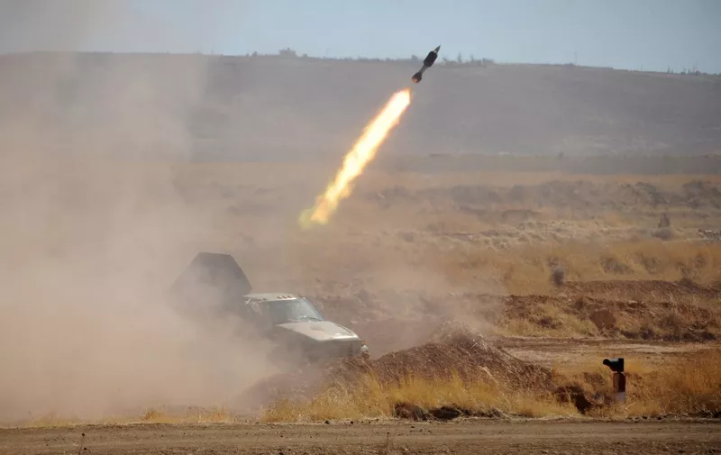 A picture taken during a guided tour with the Russian army shows the launch of a Syrian army missile during an instruction session by Russian trainers with Syrian elite soldiers, on September 24, 2019 at an army base in Yafour, some 30 kms west of Damascus. (Photo by Maxime POPOV / AFP)