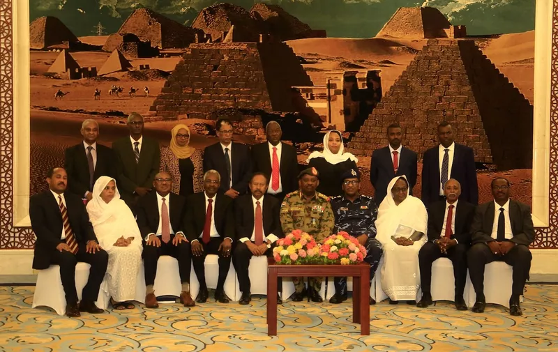 (211025) -- KHARTOUM, Oct. 25, 2021 (Xinhua) -- File photo shows Sudan's Prime Minister Abdalla Hamdok (5th L, front) and members of his cabinet posing for a group photo following a swearing-in ceremony in Khartoum, Sudan, Sept. 8, 2019. Sudanese Prime Minister Abdalla Hamdok, members of the Transitional Sovereignty Council's civilian component and several ministers have been arrested by joint military forces, Sudan's Ministry of Information and Communications said on Monday.,Image: 639716175, License: Rights-managed, Restrictions: , Model Release: no, Credit line: Profimedia