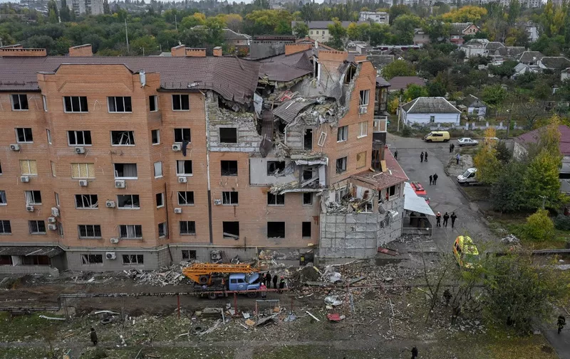 A photo shows a damaged building after a rocket attack in Mykolaiv on October 23, 2022 during the Russian invasion of Ukraine. (Photo by BULENT KILIC / AFP)