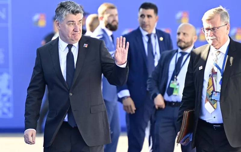 Croatia's President Zoran Milanovic (L) arrives for the NATO summit at the Ifema congress centre in Madrid, on June 29, 2022. (Photo by JAVIER SORIANO / AFP)