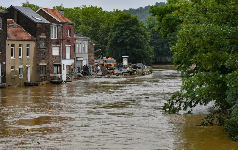 This picture shows the damage caused by the flood in the Chenee district in Liege, on July 16, 2021, after heavy rains and floods lashed western Europe. - The death toll in Belgium jumped to 15 with more than 21,000 people left without electricity in one region. (Photo by BERNARD GILLET / BELGA / AFP) / Belgium OUT
