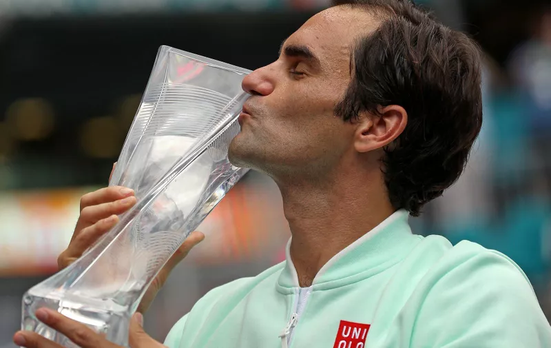 Roger Federer, of Switzerland, kisses the trophy after defeating John Isner, of the United States, 6-1, 6-4 during the final of the Miami Open tennis tournament at Hard Rock Stadium on Sunday, March 31, 2019, in Miami Gardens, Fla., Image: 423489728, License: Rights-managed, Restrictions: , Model Release: no, Credit line: Profimedia, Abaca Press