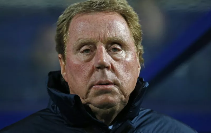 Queens Park Rangers' English manager Harry Redknapp looks on ahead of the English Premier League football match between Queens Park Rangers and Manchester City at Loftus Road Stadium in London on November 8, 2014. AFP PHOTO / JUSTIN TALLIS

RESTRICTED TO EDITORIAL USE. No use with unauthorized audio, video, data, fixture lists, club/league logos or live services. Online in-match use limited to 45 images, no video emulation. No use in betting, games or single club/league/player publications. / AFP / JUSTIN TALLIS