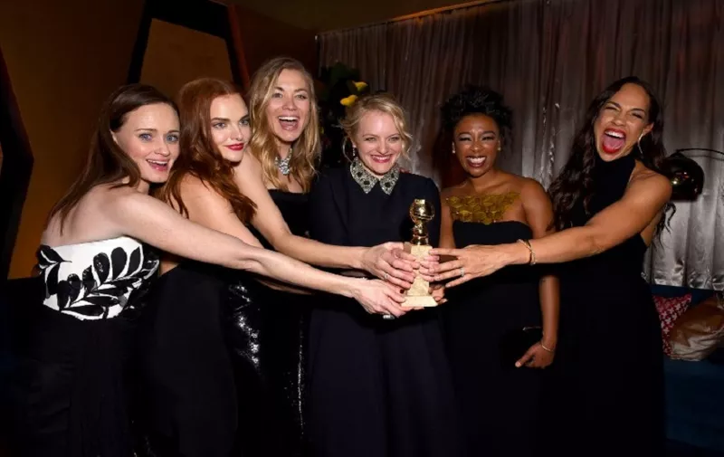 BEVERLY HILLS, CA - JANUARY 07: Alexis Bledel, Madeline Brewer, Yvonne Strahovski, Elisabeth Moss, Samira Wiley and Amanda Brugel attend FOX, FX and Hulu 2018 Golden Globe Awards After Party at The Beverly Hilton Hotel on January 7, 2018 in Beverly Hills, California.   Presley Ann/Getty Images/AFP