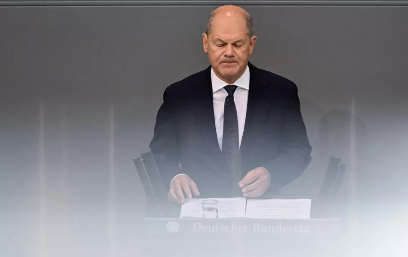 German Chancellor Olaf Scholz delivers a keynote speech on security in Germany during a session at the Bundestag, the lower house of parliament, on June 6, 2024 in Berlin. The German Chancellor said that serious criminals should be deported, even if they come from Syria or Afghanistan, after an Afghan asylum seeker killed a police officer in a knife attack. (Photo by JOHN MACDOUGALL / AFP)