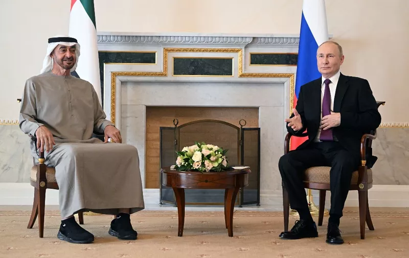 Russian President Vladimir Putin meets with United Arab Emirates President Sheikh Mohamed bin Zayed Al-Nahyan in Saint Petersburg on October 11, 2022. (Photo by Pavel Bednyakov / SPUTNIK / AFP)