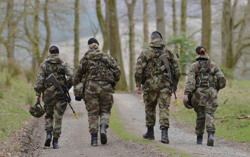 Members of the 53rd Infantry Group at the end of their training in Glen of Imaal in preparation for the unit's deployment to the United Nations Interim Force Lebanon. 
The training, taking place in the Glen of Imaal, Co. Wicklow, will test the units operational capability by putting the soldiers through their paces in a series of simulated incidents that the unit could face during their 6 month tour of duty. The 53rd Infantry Group, comprising a Mechanised Infantry Company and a Support Group, will deploy as part of an Irish/Finnish Battalion and will carry out peacekeeping duties under Chapter 6 of the United Nations Charter. Their duties will include monitoring the Blue Line between Lebanon and Israel and patrolling their designated Area of Operations. 
Glen of Imaal, Co. Wicklow, Ireland, on Tuesday April 19, 2016 (Photo by Artur Widak/NurPhoto) (Photo by Artur Widak / NurPhoto / NurPhoto via AFP)