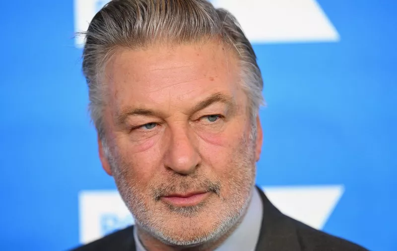 (FILES) In this file photo taken on December 06, 2022, actor Alec Baldwin arrives at the 2022 Robert F. Kennedy Human Rights Ripple of Hope Award Gala at the Hilton Midtown in New York. - The parents and sister of the cinematographer who was shot dead on the set of a low-budget western are suing star Alec Baldwin and the movie's producers, lawyers said February 9, 2023. (Photo by ANGELA WEISS / AFP)