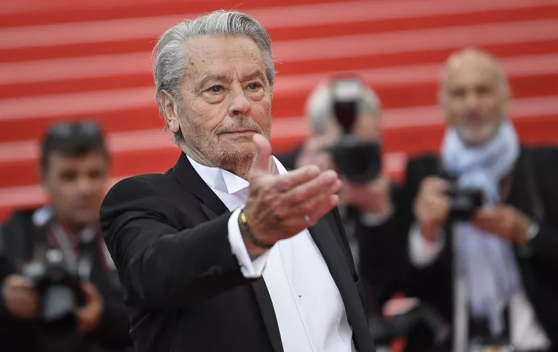 French actor Alain Delon arrives to be awarded with an Honorary Palme d'Or at the 72nd edition of the Cannes Film Festival in Cannes, southern France, on May 19, 2019. (Photo by CHRISTOPHE SIMON / AFP)