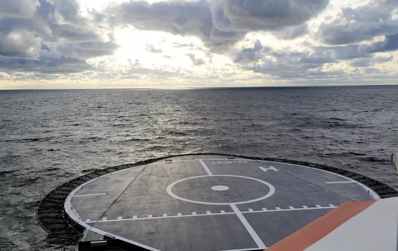 This handout picture provided by the Finnish Border Guard shows Finnish Border Guard's offshore patrol vessel Turva guarding on October 11, 2023 at sea near the place where damaged Balticconnector gas pipeline is pinpointed at the Gulf of Finland. Finnish President Sauli Niinisto said on October 10, 2023 that a leak leading to the shutdown of a natural gas pipeline from Estonia to Finland this weekend was probably caused by "external activity." (Photo by Handout / various sources / AFP)