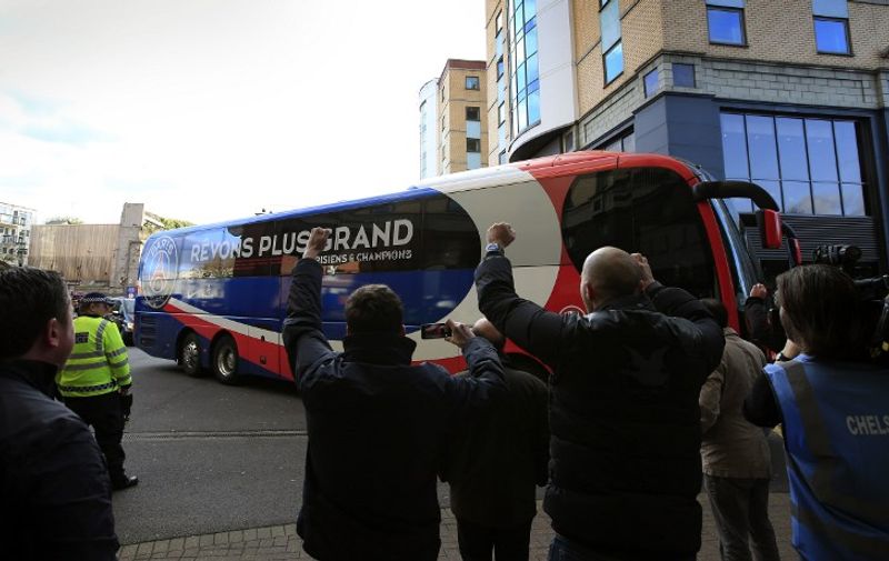 The Paris Saint-Germain team bus arrives at the stadium ahead of the UEFA Champions League quarter final second leg football match between Chelsea and at Stamford Bridge in London on April 8, 2014. AFP PHOTO / ADRIAN DENNIS / AFP / ADRIAN DENNIS