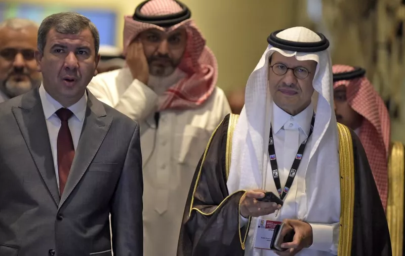 Saudi Energy Minister Prince Abdulaziz bin Salman bin Abdulaziz Al Saud (R) and Iraqi Oil Minister Ihsan Abdul-Jabbar Ismail, arrive at the 29th annual Middle East Petroleum and Gas conference in the Bahraini capital Manama on May 16, 2022. (Photo by Mazen Mahdi / AFP)