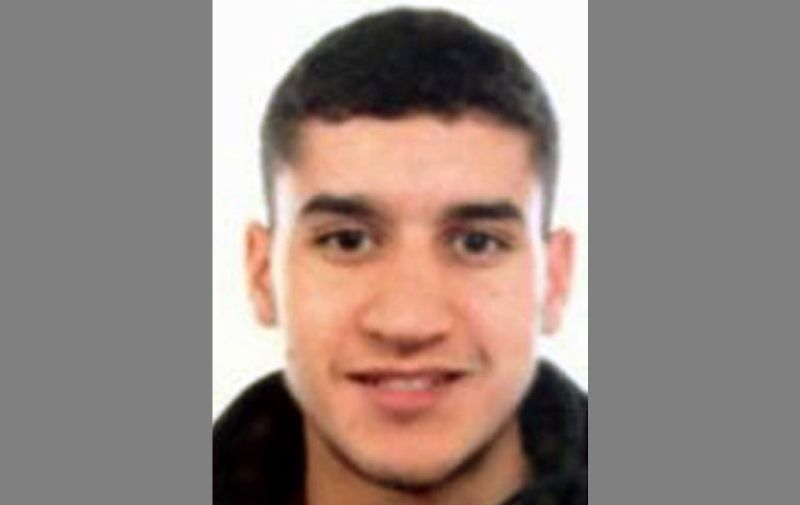 A handout picture released by the Catalan regional police "Mossos D'Esquadra" on August 18, 2017 shows Younes Abouyaaqoub, one of the suspects of the Barcelona and Cambrils attacks.
Spanish police on August 18 released the names of three Moroccans suspected of deadly terror attacks and who were shot dead overnight by security forces in the seaside resort of Cambrils. Police said they were searching for a fourth suspect, Younes Abouyaaqoub, aged 22. Drivers have ploughed on August 17, 2017 into pedestrians in two quick-succession, separate attacks in Barcelona and another popular Spanish seaside city, leaving 14 people dead and injuring more than 100 others. / AFP PHOTO / MOSSOS D'ESQUADRA / - / RESTRICTED TO EDITORIAL USE - MANDATORY CREDIT "AFP PHOTO / MOSSOS D'ESQUADRA" - NO MARKETING NO ADVERTISING CAMPAIGNS - DISTRIBUTED AS A SERVICE TO CLIENTS