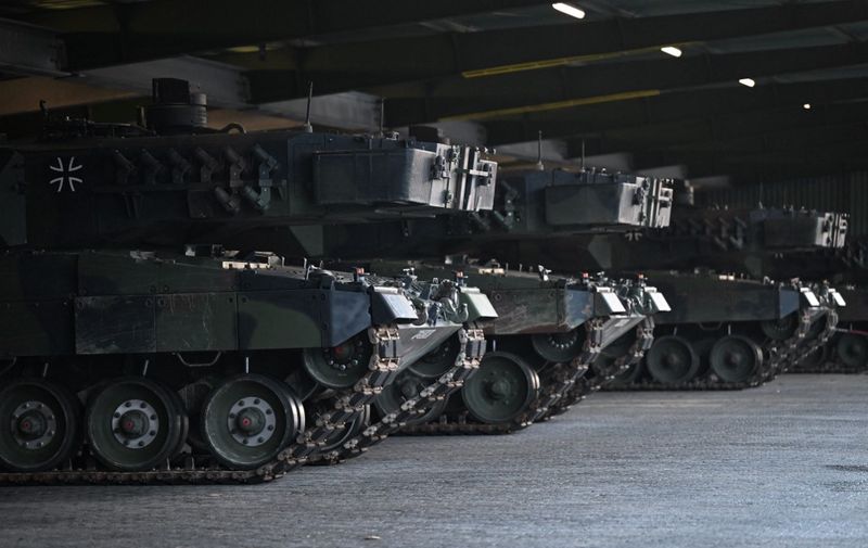 Leopard 2 tanks destined for Ukraine delivery stand parked at the training ground in Augustdorf, western Germany on February 1, 2023, during a visit of the German Defence Minister of the Bundeswehr Tank Battalion 203, to learn about the performance of the Leopard 2 main battle tank. (Photo by INA FASSBENDER / AFP)