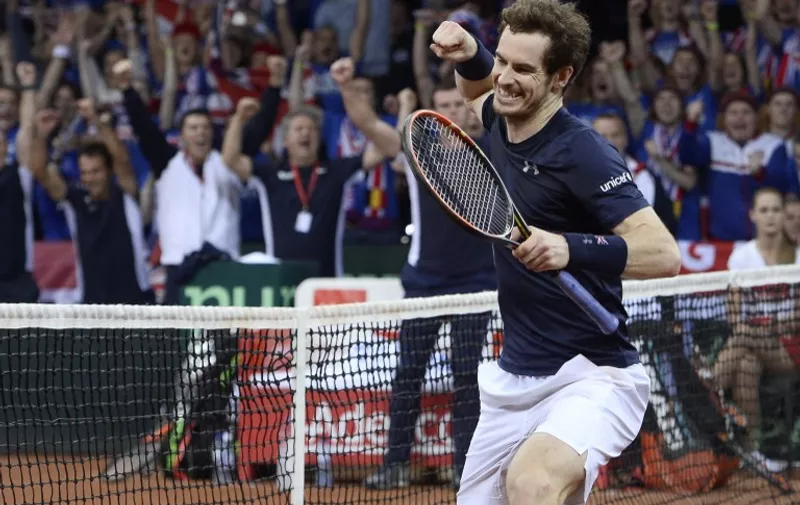 Britain's Andy Murray celebrates after his team won the doubles tennis match on the second day of the Davis Cup final between Belgium and Britain at Flanders Expo in Ghent on November 28, 2015. AFP PHOTO / BELGA / DIRK WAEM

--BELGIUM OUT-- / AFP / BELGA / DIRK WAEM