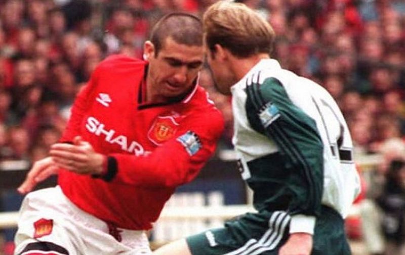 Manchester United's Eric Cantona (l)  takes the ball around Liverpool's John Scales during the first half of the FA Cup Final at Wembley Stadium 11 May. Cantona scored the only goal to win the final for his team.
            AFP PHOTO / AFP / PA/Sean DEMPSEY / ELECTRONIC IMAGE