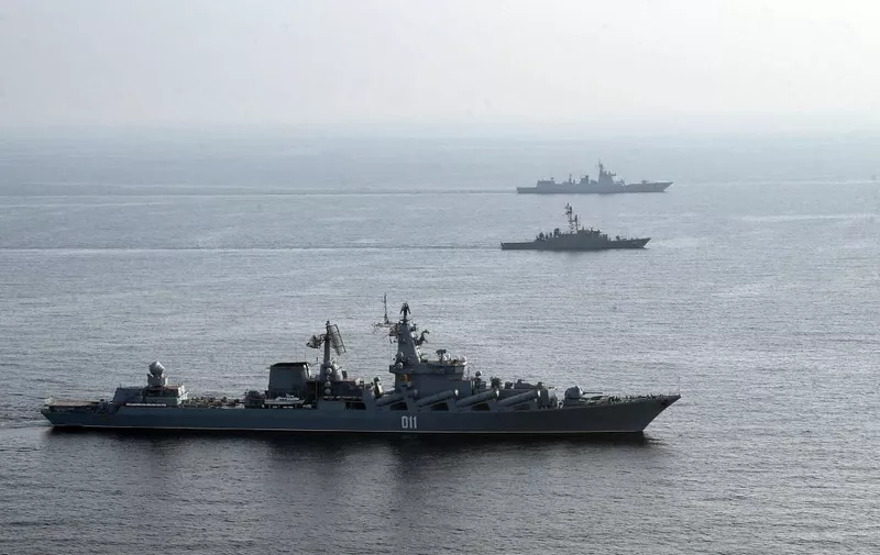 A handout picture made available by the Iranian Army official website on January, 21 2022 shows Iranian, Russia and Chinese warships during a joint military drill in the Indian ocean. - Iran, Russia and China will began today joint naval drills for three days in the Indian Ocean, seeking to reinforce "common security", an Iranian naval official said. (Photo by Iranian Army office / AFP)