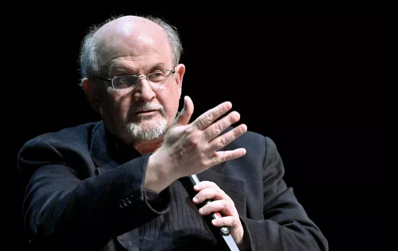 British author Salman Rushdie speaks as he presents his book "Quichotte" at the Volkstheater in Vienna, Austria, on November 16, 2019. (Photo by HERBERT NEUBAUER / APA / AFP) / Austria OUT