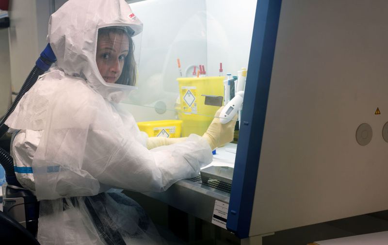 LILLE, FRANCE - FEBRUARY 20: Sandrine Belouzard, virologist and researcher, at work in high-level P3 biosafety security laboratory at the Pasteur Institute of Lille on February 20, 2020 in Lille, France. The research institute has sequenced the genome of Coronavirus 2019-nCoV using blood samples taken from the first confirmed French cases of the virus. The institute's scientists will now focus on developing how the virus works, treatments and a possible vaccine. (Photo by Sylvain Lefevre/Getty Images)