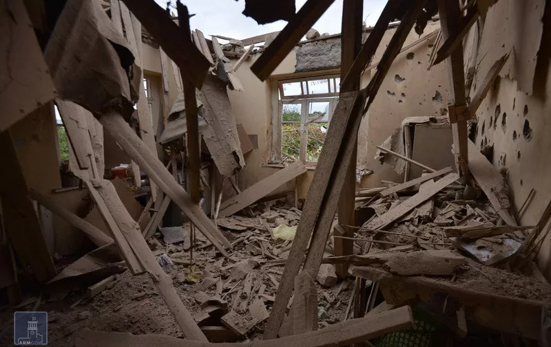 A view of a house which is said was damaged in recent shelling during clashes between Armenian separatists and Azerbaijan over the breakaway Nagorny Karabakh region, in Nagorno-Karabakh's city of Martuni on September 28, 2020. (Photo by Handout / Armenian Foreign Ministry / AFP) / RESTRICTED TO EDITORIAL USE - MANDATORY CREDIT "AFP PHOTO / Armenian Foreign Ministry / handout" - NO MARKETING NO ADVERTISING CAMPAIGNS - DISTRIBUTED AS A SERVICE TO CLIENTS --- NO ARCHIVE ---