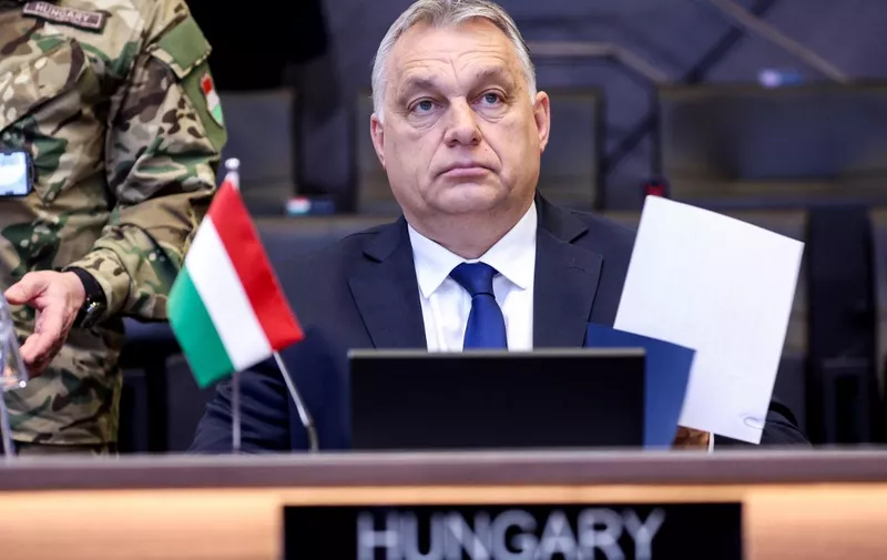 Hungary's Prime Minister Viktor Orban attends a NATO video summit on Russia's invasion of the Ukraine at the NATO headquarters in Brussels on February 25, 2022. - Russian forces reached the outskirts of Kyiv on February 25, 2022, as Ukrainian President Volodymyr Zelensky said the invading troops were targeting civilians and explosions could be heard in the besieged capital. (Photo by Kenzo TRIBOUILLARD / AFP)