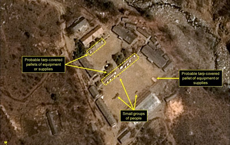 This handout picture obtained on April 13, 2017 from French space agency Centre national d'etudes spatiales (CNES - National Centre for Space Studies), Airbus Defense and Space and the 38 North analysis group, shows a satellite image taken on April 12, 2017 of North Korea's Punggye-ri Nuclear Test Site, with probable tarp-covered pallets and personnel in the Main Administrative Area.
North Korea is ready to launch a nuclear test at its Punggye-ri Nuclear Test Site, the 38 North monitoring group reported on April 12, 2017. "Commercial satellite imagery of North Koreas Punggye-ri Nuclear Test Site from April 12 shows continued activity around the North Portal, new activity in the Main Administrative Area, and a few personnel around the sites Command Center," the North Korea-related analysis website said.  / AFP PHOTO / CNES AND Airbus Defense &amp; Space and 38 North / HO / RESTRICTED TO EDITORIAL USE - MANDATORY CREDIT "AFP PHOTO / CNES / Airbus Defense and Space / 38 North" - NO MARKETING NO ADVERTISING CAMPAIGNS - DISTRIBUTED AS A SERVICE TO CLIENTS