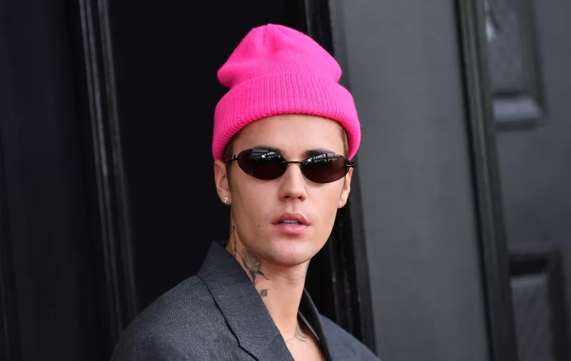 Canadian singer-songwriter Justin Bieber arrives for the 64th Annual Grammy Awards at the MGM Grand Garden Arena in Las Vegas on April 3, 2022. (Photo by ANGELA WEISS / AFP)