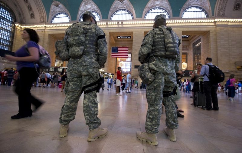 Army National Guard officers patrol Grand Central Station September 10, 2011 in New York. Security in New York remains on alert after reports of a terror threat.   AFP PHOTO/DON EMMERT (Photo by DON EMMERT / AFP)