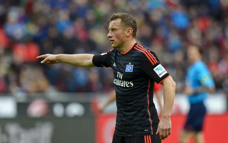 Hamburg's Ivica Olic gestures during the German first division Bundesliga football match Bayer 04 Leverkusen vs Hamburg SV in Leverkusen, western Germany, on April 4, 2015.  AFP PHOTO /  

RESTRICTIONS - DFL RULES TO LIMIT THE ONLINE USAGE DURING MATCH TIME TO 15 PICTURES PER MATCH. IMAGE SEQUENCES TO SIMULATE VIDEO IS NOT ALLOWED AT ANY TIME. FOR FURTHER QUERIES PLEASE CONTACT DFL DIRECTLY AT + 49 69 650050.