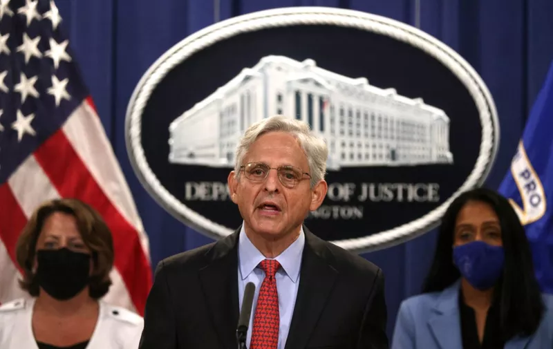 WASHINGTON, DC - SEPTEMBER 09: U.S. Attorney General Merrick Garland (C) speaks as Deputy Attorney General Lisa Monaco (L) and Associate Attorney General Vanita Gupta (R) listen during a news conference to announce a civil enforcement action at the Department of Justice on September 9, 2021 in Washington, DC. Attorney General Garland said the Department of Justice is filing a lawsuit against the state of Texas over the states restrictive law to ban almost all abortions.   Alex Wong/Getty Images/AFP (Photo by ALEX WONG / GETTY IMAGES NORTH AMERICA / Getty Images via AFP)